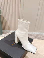 ALAIA 26S HEELED BOOTS 90 MM IN WHITE CALFSKIN