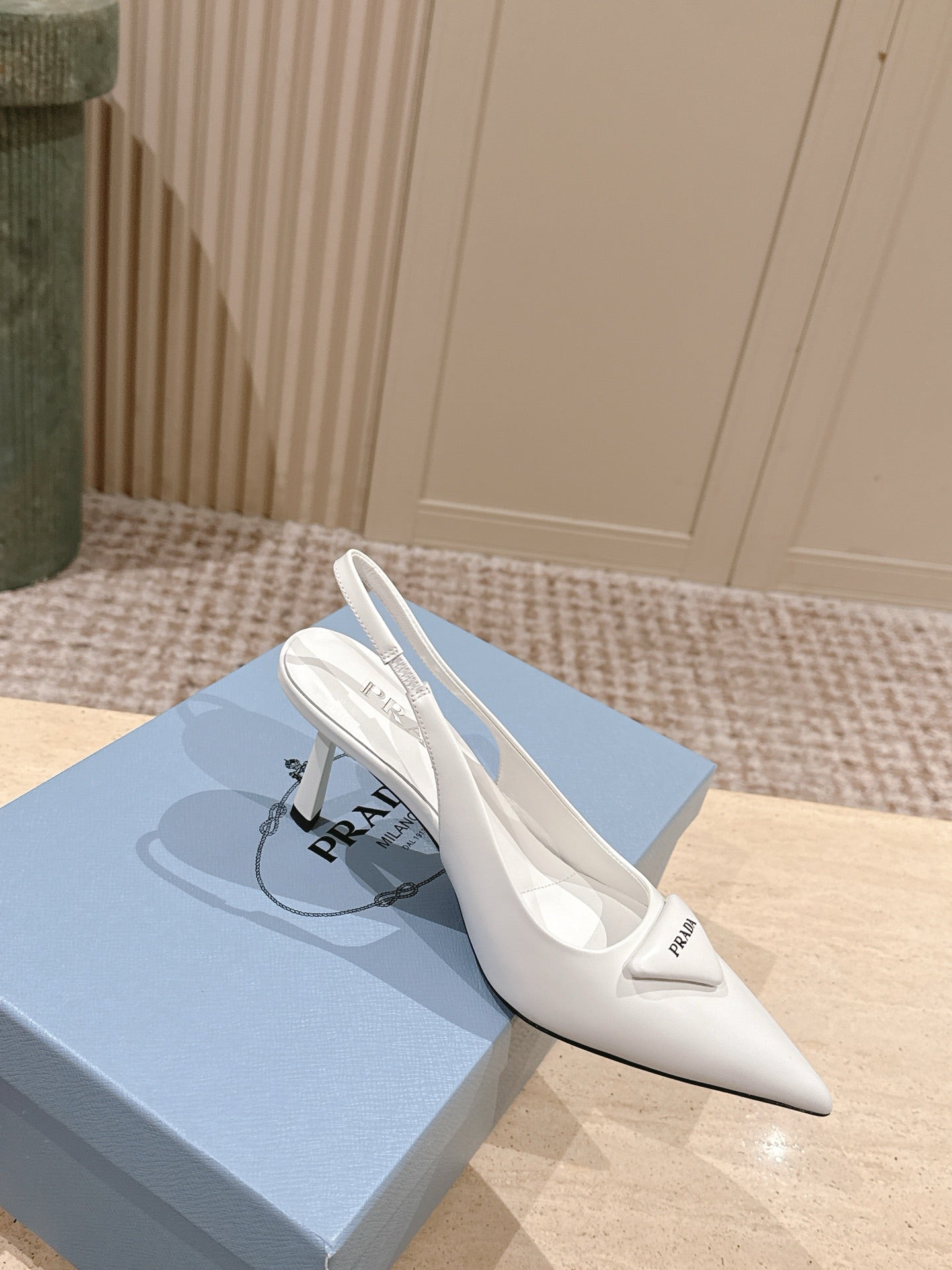 PRADA 26S POINTED-TOE SLINGBACK HEELS 75MM IN WHITE SHINY CALFSKIN