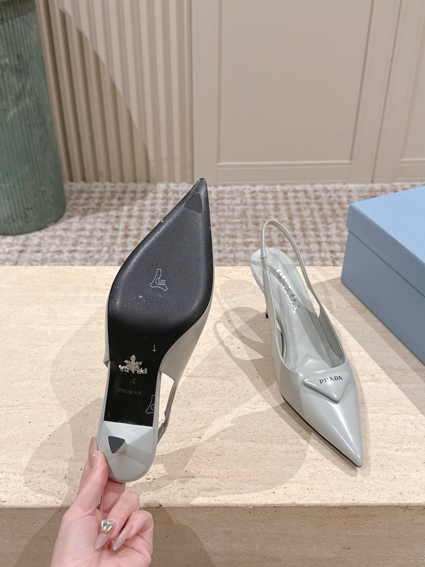 PRADA 26S POINTED-TOE SLINGBACK HEELS 75MM IN SOFT GRAY SHINY CALFSKIN