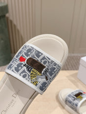 DIOR 26S SLIDE SANDALS IN WHITE MONOGRAM EMBROIDERED CANVAS