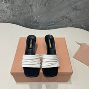 HIGH - HEEL WHITE MIX BLACK SHEEPSKIN WITH STYLIZED STRAPS