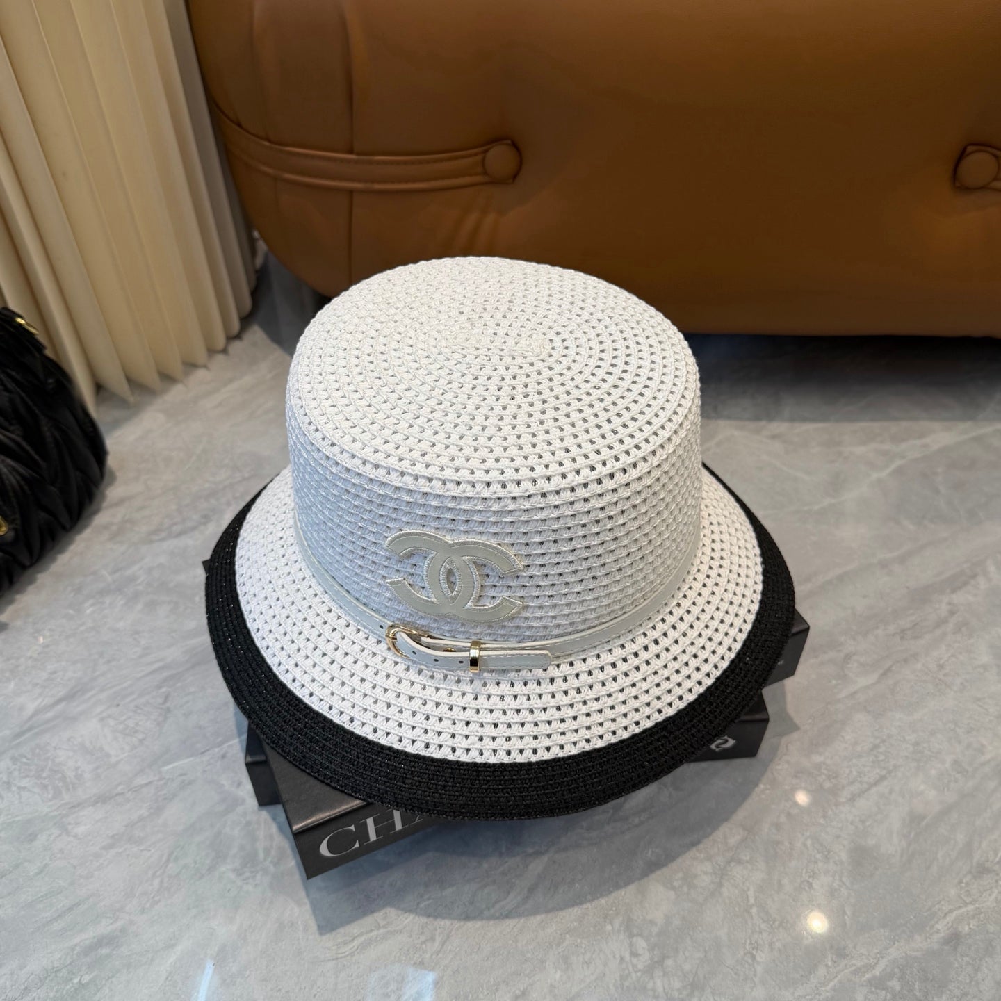 CHANEL 26S FLAT-BRIM STRAW HAT WITH RAISED CC LOGO 338109