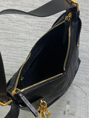 DIOR 25S SMALL VOYAGE BAG 23 IN BLACK FLAT MACROCANNAGE GRAINED GLOSSY CALFSKIN