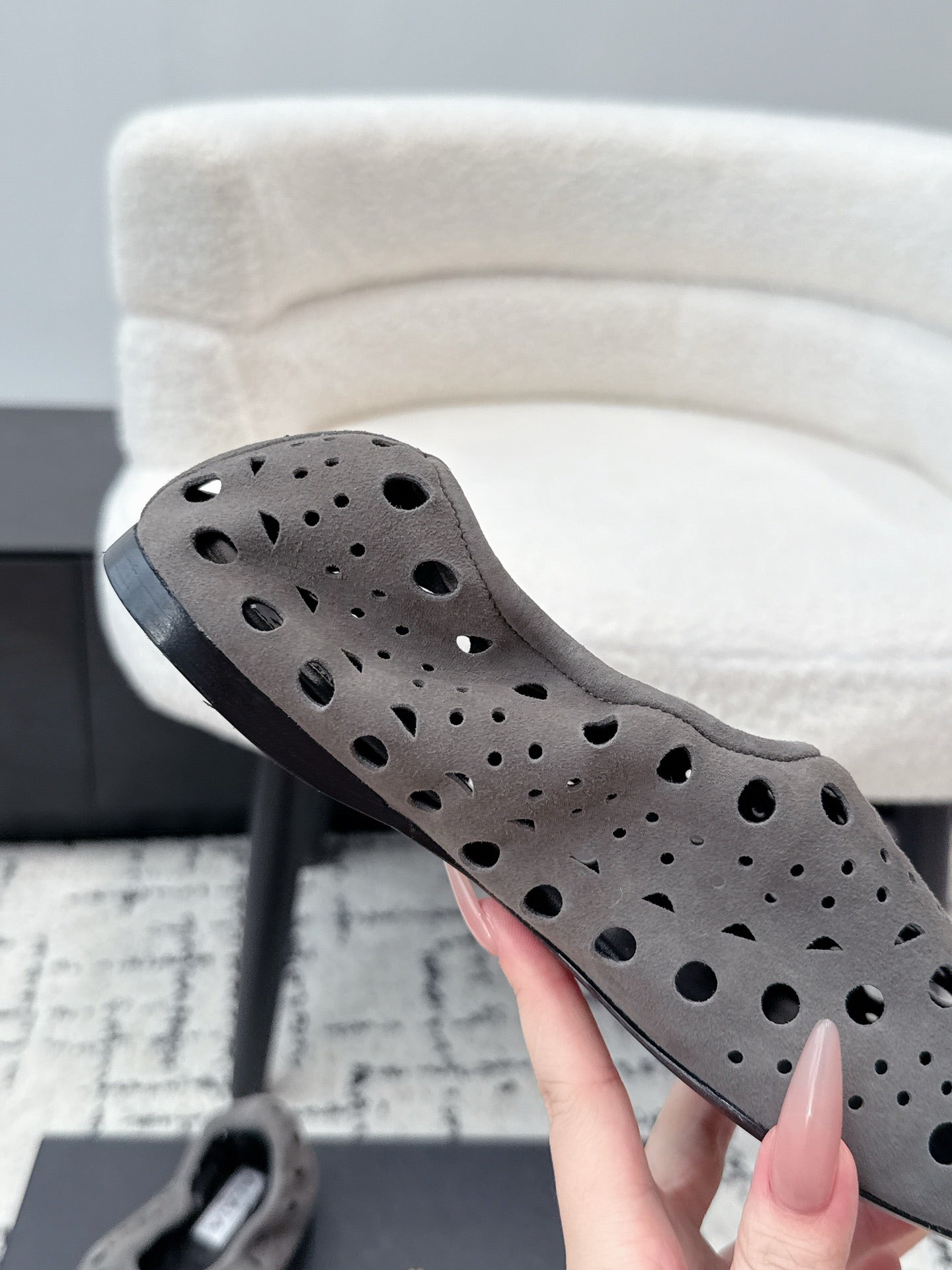 ALAIA 26S FLAT SLIP-ONS IN GREY SUEDE WITH OPENWORK PATTERN