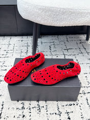 ALAIA 26S FLAT SLIP-ONS IN RED SUEDE WITH OPENWORK PATTERN
