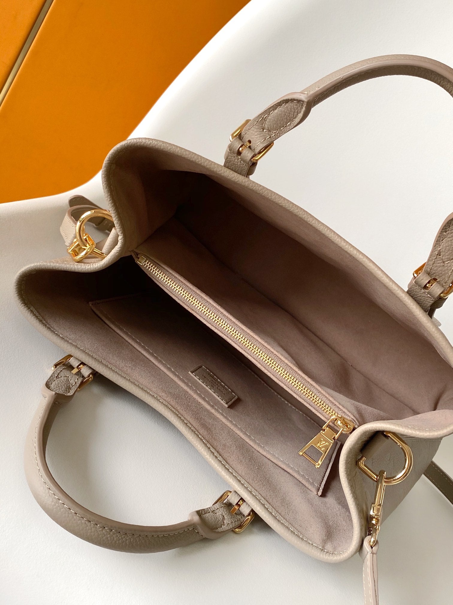 LV 25S BABYLONE TOTE BAG 32 IN TOURTERELLE GREY CALFSKIN GOLD HARDWARE