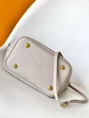 BLOSSOM 20 IN LIGHT BEIGE MAHINA CALFSKIN