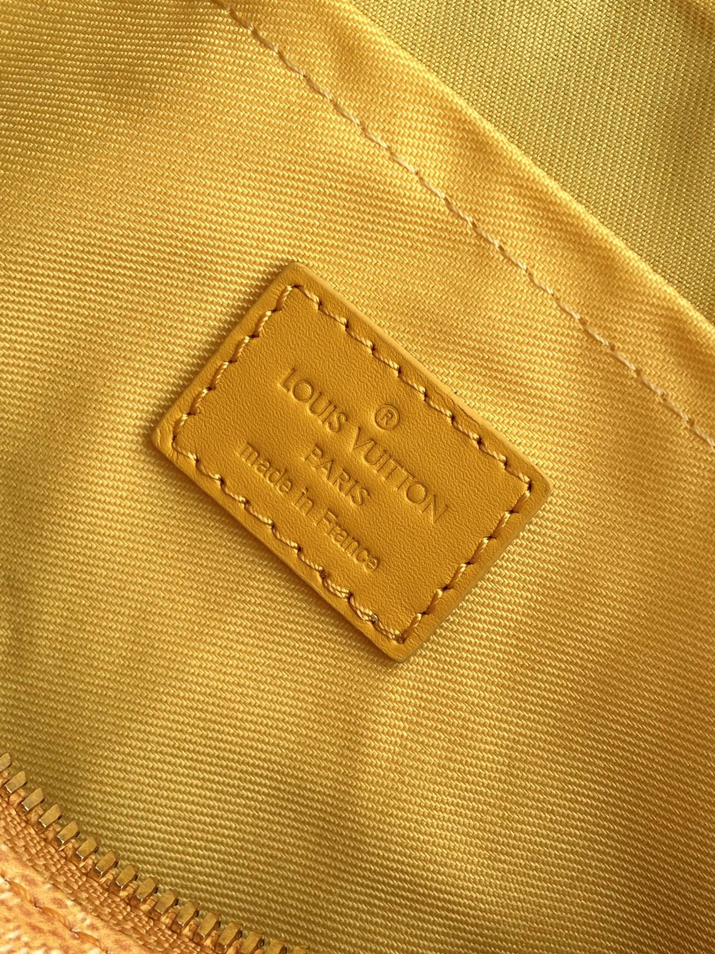 KEEPALL BANDOULIÈRE 25 IN ORANGE MONOGRAM HERITAGE CANVAS