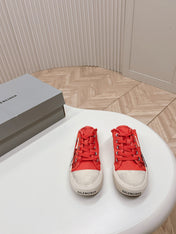 SNEAKER MULES IN RED CANVAS GRAFFITI LOGO