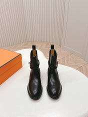 KELLY BUCKLE SHORT BOOTS IN BLACK CALFSKIN