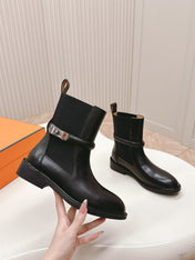 KELLY BUCKLE SHORT BOOTS IN BLACK CALFSKIN