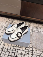 PRADA 26S BUCKLED LOAFERS IN WHITE CALFSKIN