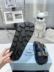 PRADA 25S STRAP SLIDES 30MM IN BLACK CALFSKIN GOLD HARDWARE