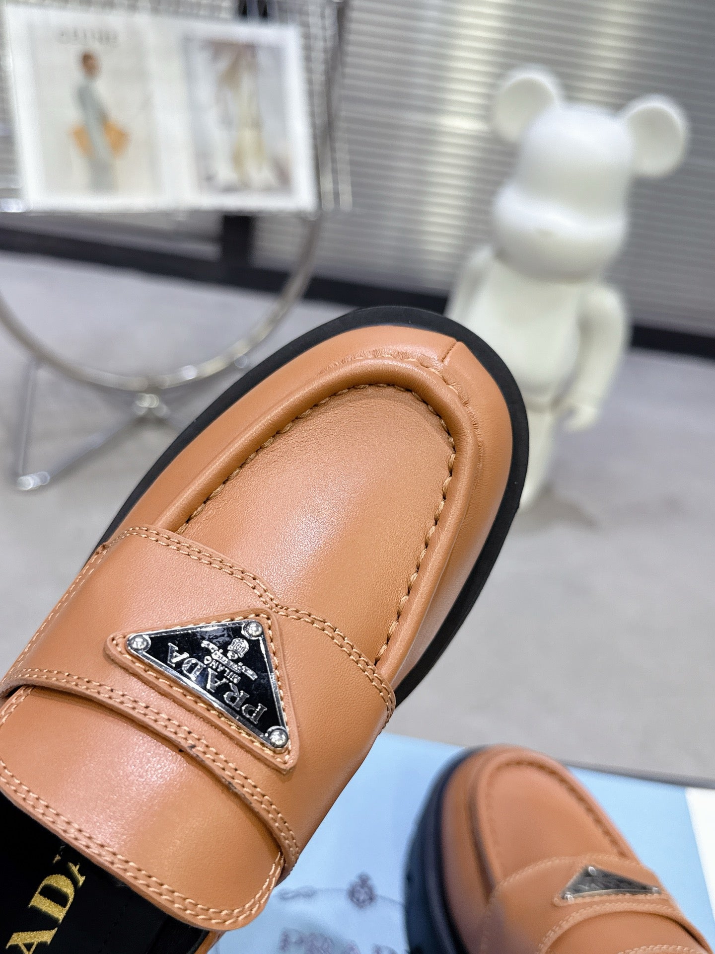 PRADA 25S THICK-SOLE LOAFERS 60 MM IN COGNAC BROWN CALFSKIN