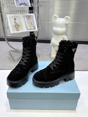 PRADA 25S WARRIOR BOOTS IN BLACK SUEDE