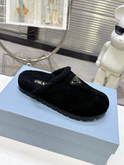 PRADA 25S FUR-LINED SABOT MULES IN BLACK SUEDE