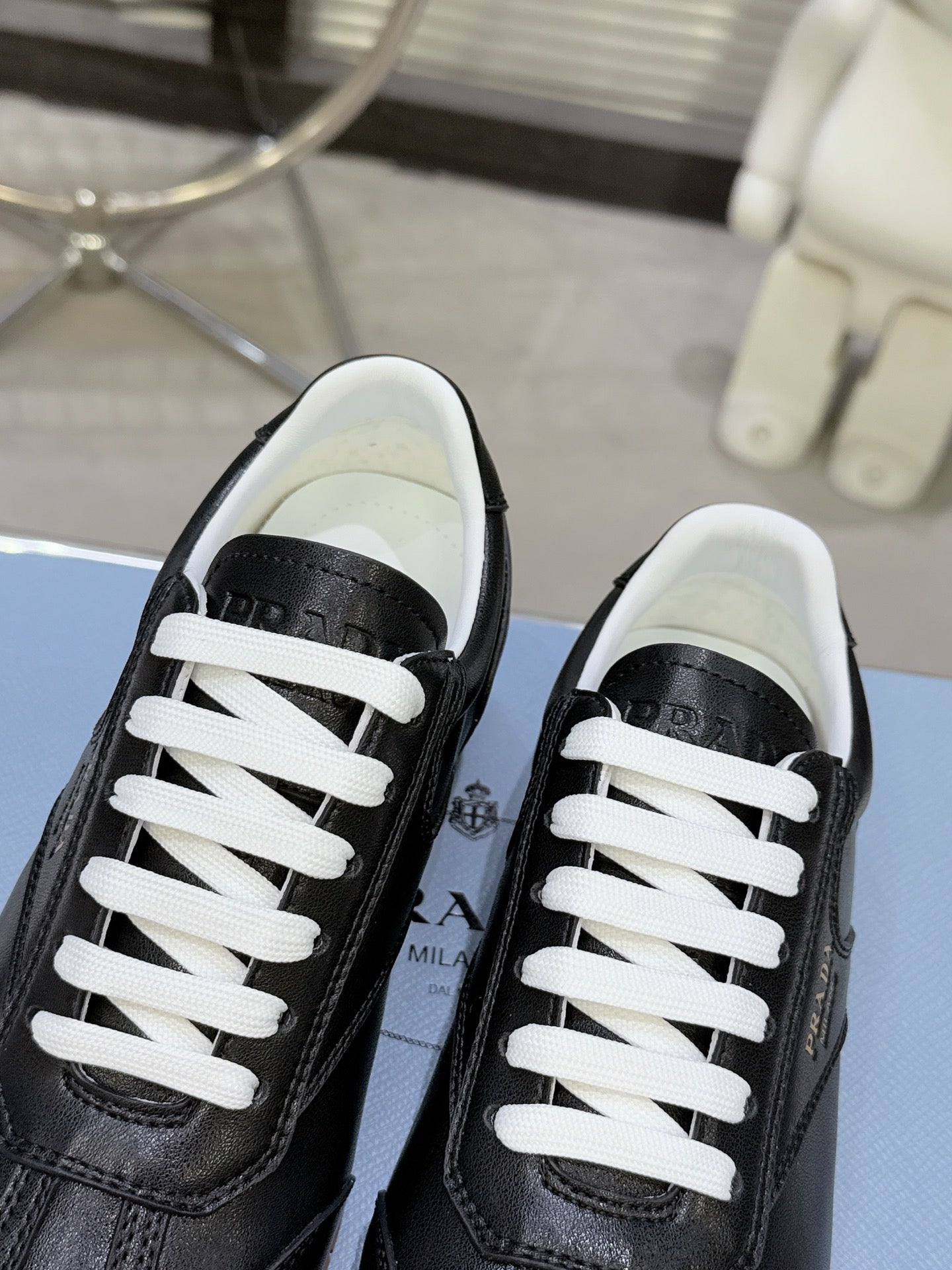 PRADA 26S LACE UP SNEAKERS IN BLACK CALFSKIN