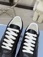 PRADA 26S LACE UP SNEAKERS IN BLACK CALFSKIN