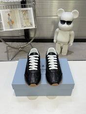PRADA 26S LACE UP SNEAKERS IN BLACK CALFSKIN