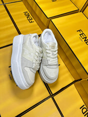 FENDI THICK-SOLDED SNEAKER IN WHITE SUEDE AND MONOGRAM FABRIC
