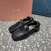 HIGH BROGUE LOAFERS IN BLACK LAMBSKIN