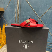 BALMAIN 26S CROSS-STRAP SLIDES IN RED CALFSKIN
