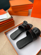 0RAN SANDALS IN BLACK CALFSKIN