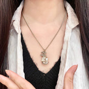 CHANEL 26S DOUBLE C LOGO SAILBOAT PENDANT NECKLACE WITH PEARL IN GOLD METAL 630060