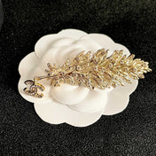 CHANEL 26S DOUBLE C LOGO CRYSTAL EMBELLISHED LEAF BROOCH IN GOLD METAL 630082