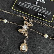 CHANEL 26S DOUBLE C LOGO PEARL LAYERED CHAIN BOW & CRYSTAL DROP NECKLACE IN GOLD METAL 629883