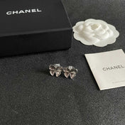 CHANEL 26S FOUR PETAL FLOWER STUD EARRINGS IN SILVER METAL 631032