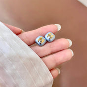 CHANEL 26S DOUBLE C LOGO BLUE ENAMEL SQUARE STUD EARRINGS IN GOLD METAL 631038