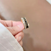 CD 26S CRYSTAL BAND LOGO RING IN GOLD TONE METAL 630811