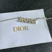 CD 26S PAVE LOGO LETTER NECKLACE IN SILVER TONE METAL 631805