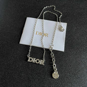 CD 26S PAVE LOGO LETTER NECKLACE IN SILVER TONE METAL 631805