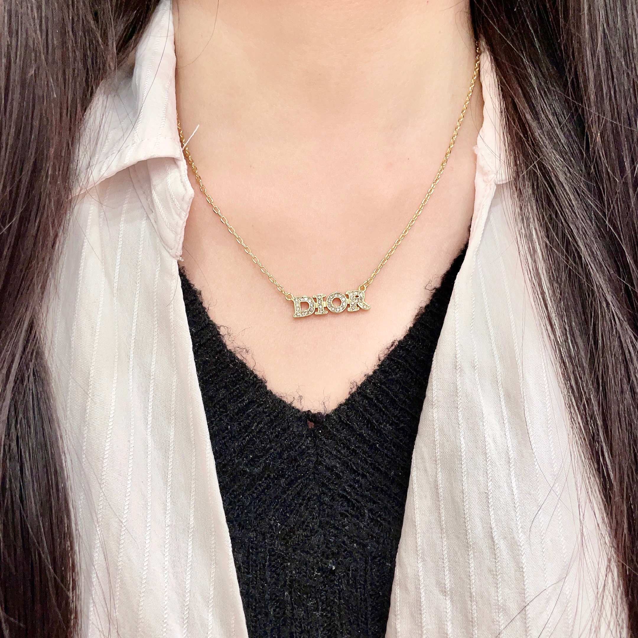 CD 26S PAVE LOGO LETTER NECKLACE IN GOLD TONE METAL 631806