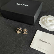 CHANEL 26S DOUBLE C LOGO PEARL STUD EARRINGS WITH FLORAL DETAIL IN GOLD METAL 631917