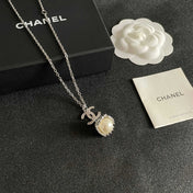 CHANEL 26S DOUBLE C LOGO PEARL DROP PENDANT NECKLACE WITH CRYSTAL HALO IN SILVER METAL 633293