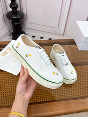 DIOR 26S LOW TOP SNEAKERS IN WHITE CANVAS WITH DAISY EMBROIDERY