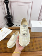 DIOR 26S LOW TOP SNEAKERS IN BEIGE CANVAS WITH WHITE LACE TRIM & LOGO PRINT