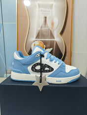 DIOR 26S LOW-TOP SNEAKER IN WHITE AND BLUE CALFSKIN