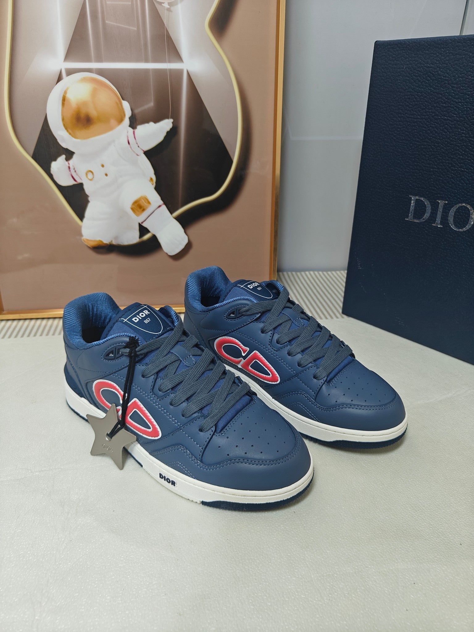DIOR 26S LOW-TOP SNEAKER IN DARK BLUE CALFSKIN