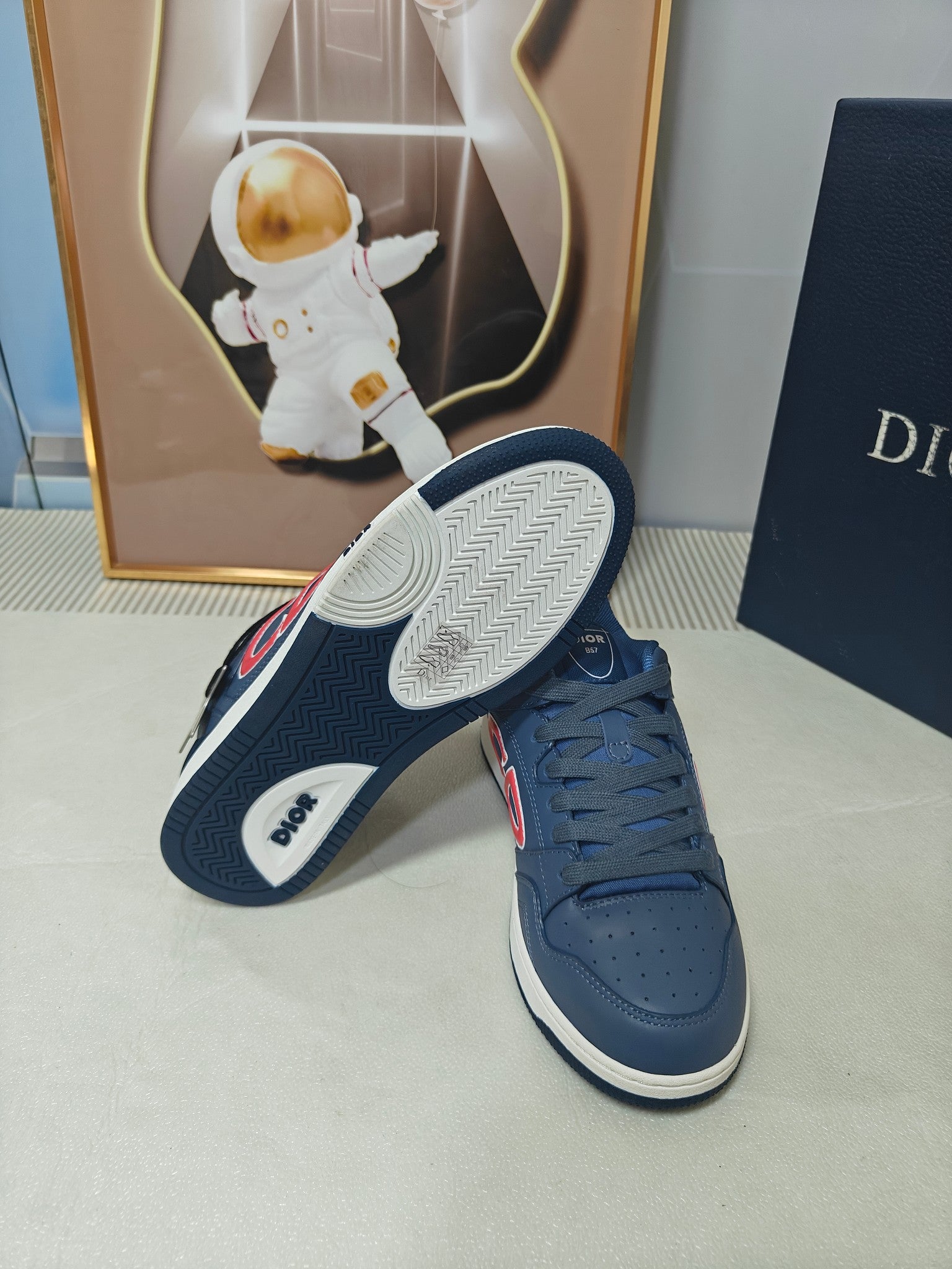 DIOR 26S LOW-TOP SNEAKER IN DARK BLUE CALFSKIN