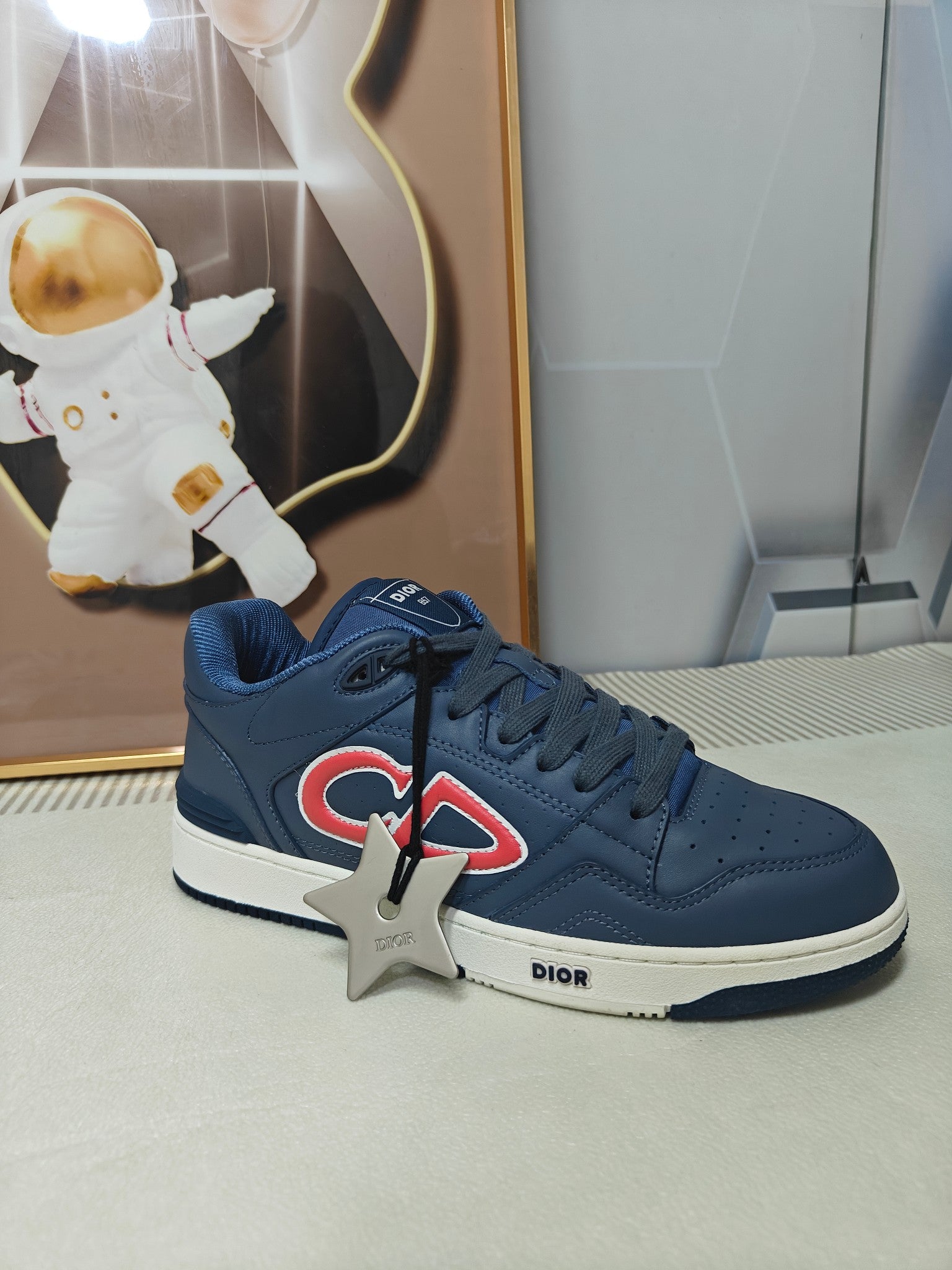 DIOR 26S LOW-TOP SNEAKER IN DARK BLUE CALFSKIN