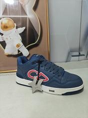 DIOR 26S LOW-TOP SNEAKER IN DARK BLUE CALFSKIN