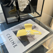 CHANEL 26S HAIR CLIP IN YELLOW ACETATE 512125