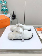 SLIP-ON MULE IN WHITE CALFSKIN AND SHEARLING LINING