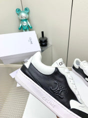 SNEAKER WITH TRIOMPHE IN BLACK AND WHITE CALFSKIN