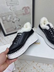 CHLOÉ 26S WEDGE SOLE SNEAKERS IN BLACK CALFSKIN