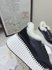 CHLOÉ 26S WEDGE SOLE SNEAKERS IN BLACK CALFSKIN